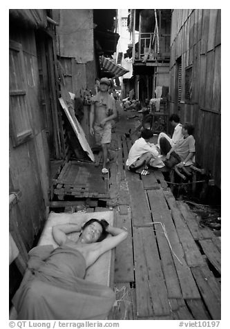 Sleeping late in a narrow alley. Ho Chi Minh City, Vietnam