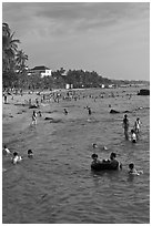 Water play on Long Beach, Duong Dong. Phu Quoc Island, Vietnam (black and white)