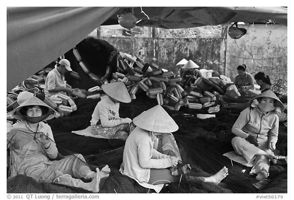 Women mending fishing nets, Duong Dong. Phu Quoc Island, Vietnam (black and white)