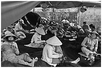 Women mending fishing nets, Duong Dong. Phu Quoc Island, Vietnam (black and white)