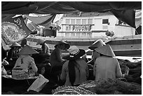 Women repairing fish nets, Duong Dong. Phu Quoc Island, Vietnam ( black and white)