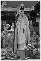 Statue in front of buddhist temple, Duong Dong. Phu Quoc Island, Vietnam (black and white)