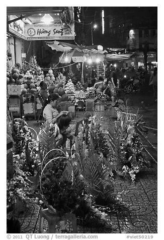 Flower and vegetable stores at night. Ho Chi Minh City, Vietnam (black and white)