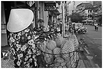 Durians for sale on street. Ho Chi Minh City, Vietnam ( black and white)