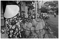 Durians for sale on street. Ho Chi Minh City, Vietnam (black and white)