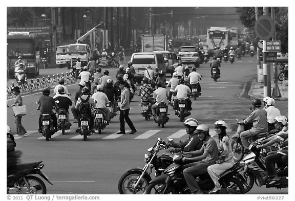 Motorcyle traffic on large avenue. Ho Chi Minh City, Vietnam (black and white)