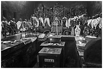 Room with figures of 12 women, each examplifying a human characteristic, Jade Emperor Pagoda, district 3. Ho Chi Minh City, Vietnam (black and white)