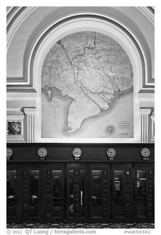 Phone booths and colonial-area map, Central Post Office. Ho Chi Minh City, Vietnam (black and white)