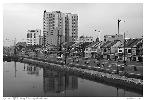 Expressway and high rise on the banks of the Saigon Arroyau. Cholon, Ho Chi Minh City, Vietnam (black and white)