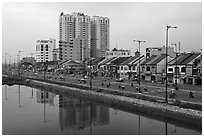 Expressway and high rise on the banks of the Saigon Arroyau. Cholon, Ho Chi Minh City, Vietnam (black and white)