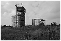 High rise towers in construction on former swampland, Phu My Hung, district 7. Ho Chi Minh City, Vietnam (black and white)