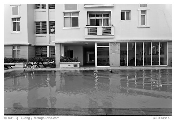 Swimming pool in appartnment complex, Phu My Hung, district 7. Ho Chi Minh City, Vietnam (black and white)