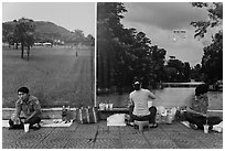 Male students, female food vendor, and landscapes. Ho Chi Minh City, Vietnam ( black and white)