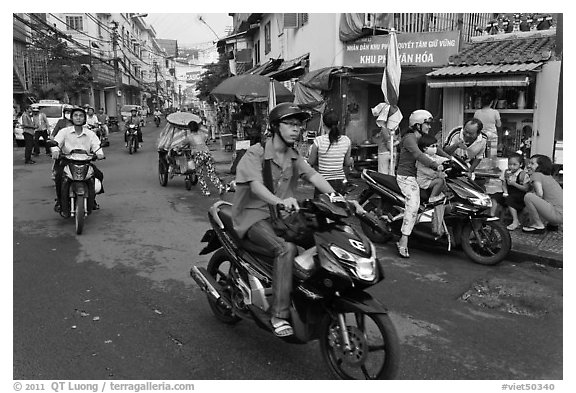 Early morning street scene. Ho Chi Minh City, Vietnam (black and white)