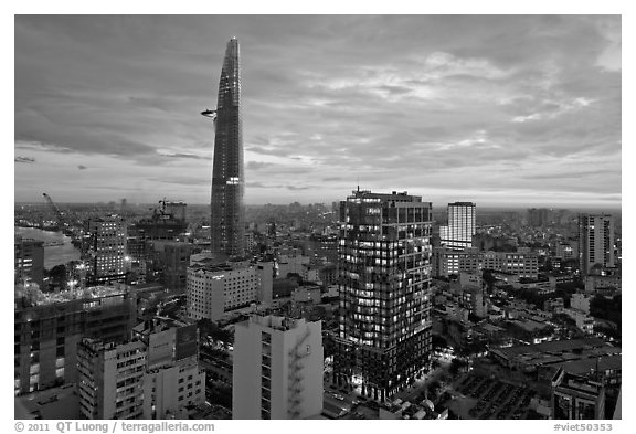 Bitexco Tower and downtown high rises at sunset. Ho Chi Minh City, Vietnam (black and white)