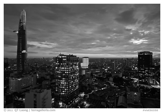 Bitexco Tower and city skyline at sunset. Ho Chi Minh City, Vietnam (black and white)