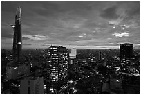 Bitexco Tower and city skyline at sunset. Ho Chi Minh City, Vietnam (black and white)