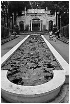 Waterlilly basin and temple gate, Cong Vien Van Hoa Park. Ho Chi Minh City, Vietnam (black and white)