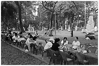 Outdoor refreshments served in front of sculpture garden, Cong Vien Van Hoa Park. Ho Chi Minh City, Vietnam (black and white)