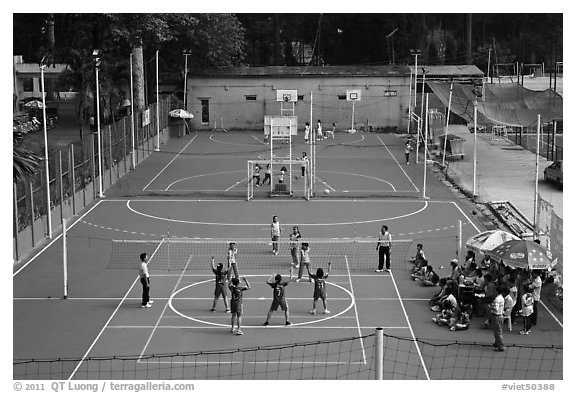 Girls Volleyball players and coaches, Cong Vien Van Hoa Park. Ho Chi Minh City, Vietnam