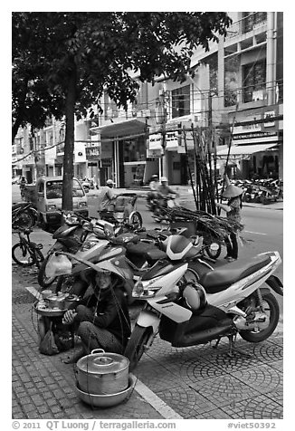 Tofu vendor and sugar cane vendor on the street. Ho Chi Minh City, Vietnam (black and white)