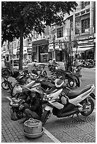 Tofu vendor and sugar cane vendor on the street. Ho Chi Minh City, Vietnam ( black and white)