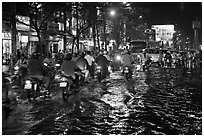 Flooded street and light reflections. Ho Chi Minh City, Vietnam (black and white)