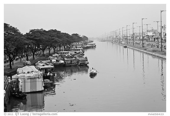 Cargo boats moored on Saigon Arroyau. Cholon, Ho Chi Minh City, Vietnam