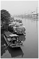 Mariners aboard barges, Saigon Arroyau. Cholon, Ho Chi Minh City, Vietnam (black and white)