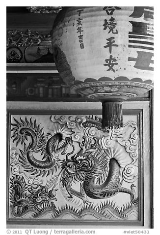 Lantern and ceramic dragon, Ha Chuong Hoi Quan Pagoda. Cholon, District 5, Ho Chi Minh City, Vietnam (black and white)