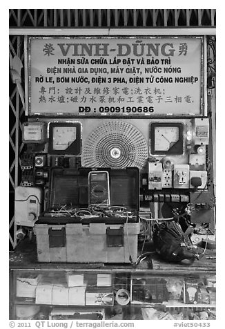 Electric repair store. Cholon, Ho Chi Minh City, Vietnam (black and white)