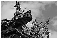 Ceramic figures on roof, Quan Am Pagoda. Cholon, District 5, Ho Chi Minh City, Vietnam (black and white)