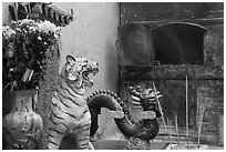 Ceramic tiger, dragon, and oven, Quan Am Pagoda. Cholon, District 5, Ho Chi Minh City, Vietnam (black and white)