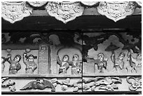 Ceramic scenes from traditional Chinese stories, Quan Am Pagoda. Cholon, District 5, Ho Chi Minh City, Vietnam (black and white)