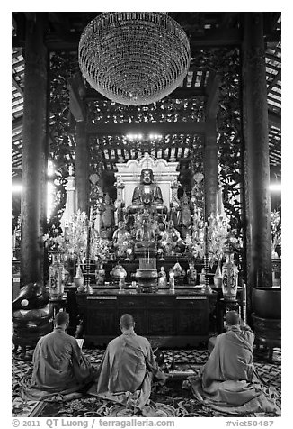 Monks in worship, Giac Lam Pagoda, Tan Binh District. Ho Chi Minh City, Vietnam
