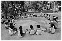 Uniformed schoolchildren, Cong Vien Van Hoa Park. Ho Chi Minh City, Vietnam (black and white)