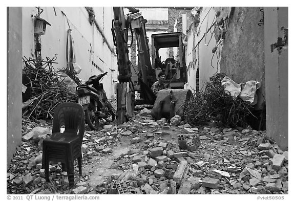 Building demolition works. Ho Chi Minh City, Vietnam (black and white)