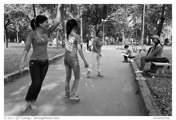 Young women practising dance, Cong Vien Van Hoa Park. Ho Chi Minh City, Vietnam