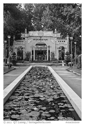 Lilly pond and temple gate, Cong Vien Van Hoa Park. Ho Chi Minh City, Vietnam