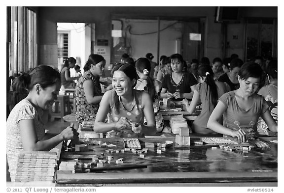 Productin of candy through manual labor. Ben Tre, Vietnam (black and white)