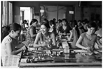 Productin of candy through manual labor. Ben Tre, Vietnam (black and white)