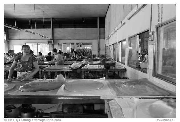 Uncut coconut candy in factory. Ben Tre, Vietnam (black and white)