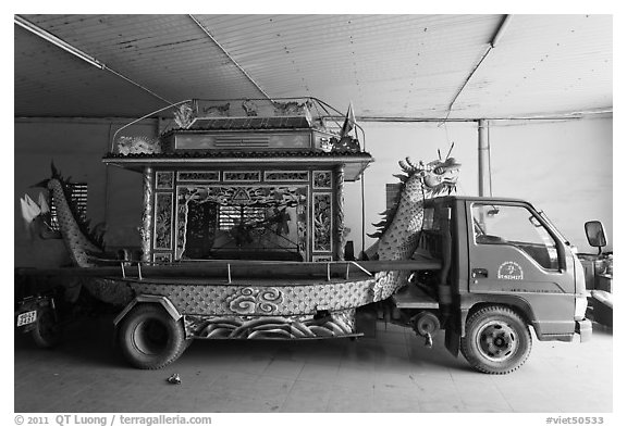 Funeral truck, Saigon Caodai temple, district 5. Ho Chi Minh City, Vietnam (black and white)