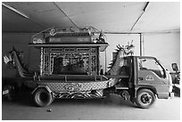 Funeral truck, Saigon Caodai temple, district 5. Ho Chi Minh City, Vietnam (black and white)