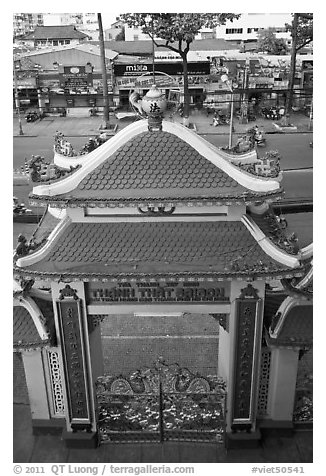 Exterior gate and street from above, Saigon Caodai temple, district 5. Ho Chi Minh City, Vietnam (black and white)