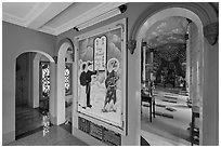 Hall with fresco feature three saints, Saigon Caodai temple, district 5. Ho Chi Minh City, Vietnam (black and white)