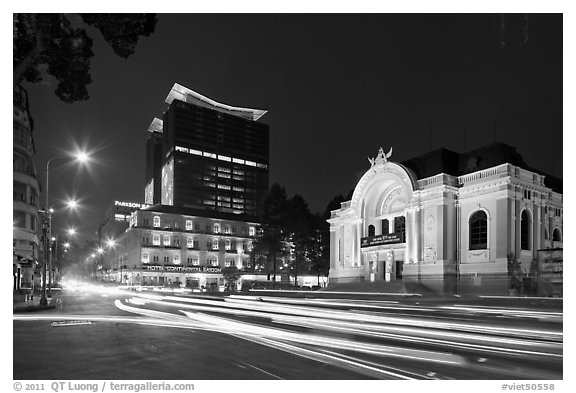 Opera house and streaks from traffic at night. Ho Chi Minh City, Vietnam (black and white)