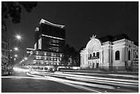 Opera house and streaks from traffic at night. Ho Chi Minh City, Vietnam (black and white)