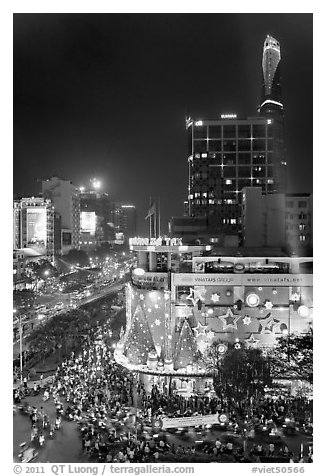 Cityscape elevated view at night with dense traffic on streets. Ho Chi Minh City, Vietnam