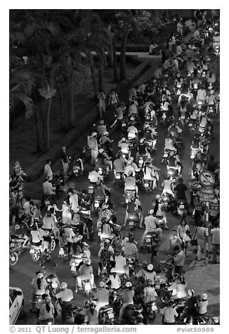 Heavy motorcycle traffic on Nguyen Hue boulevard at night. Ho Chi Minh City, Vietnam